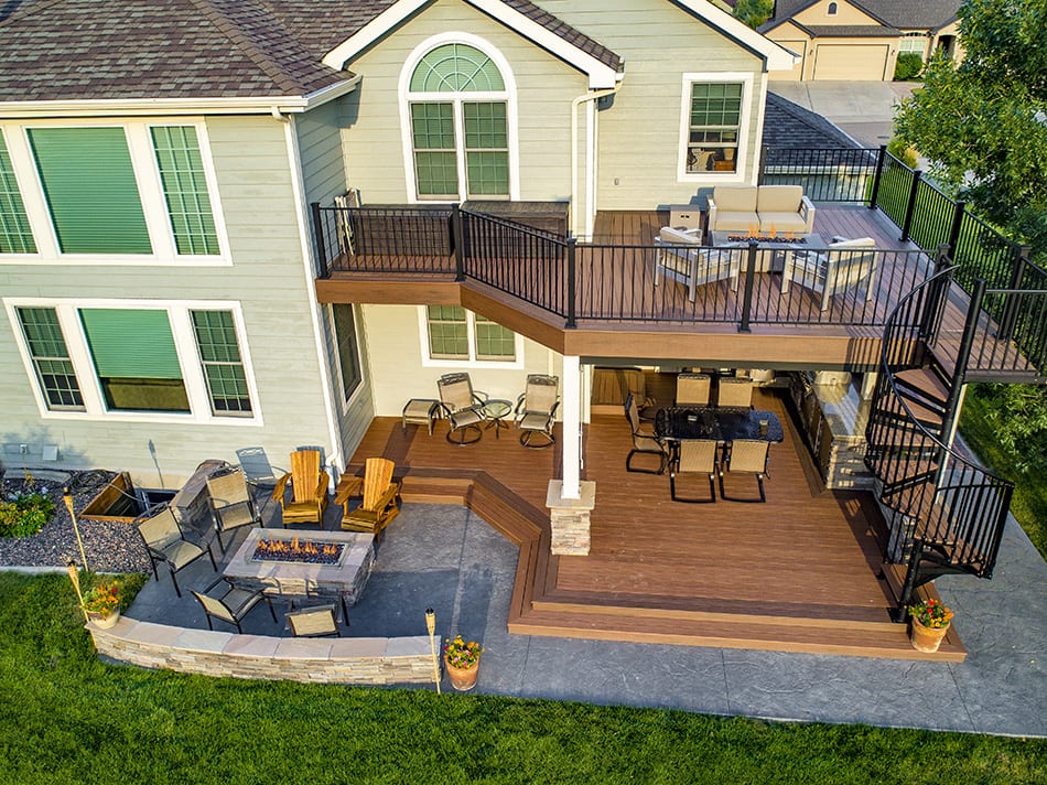multi-level deck on tan house
