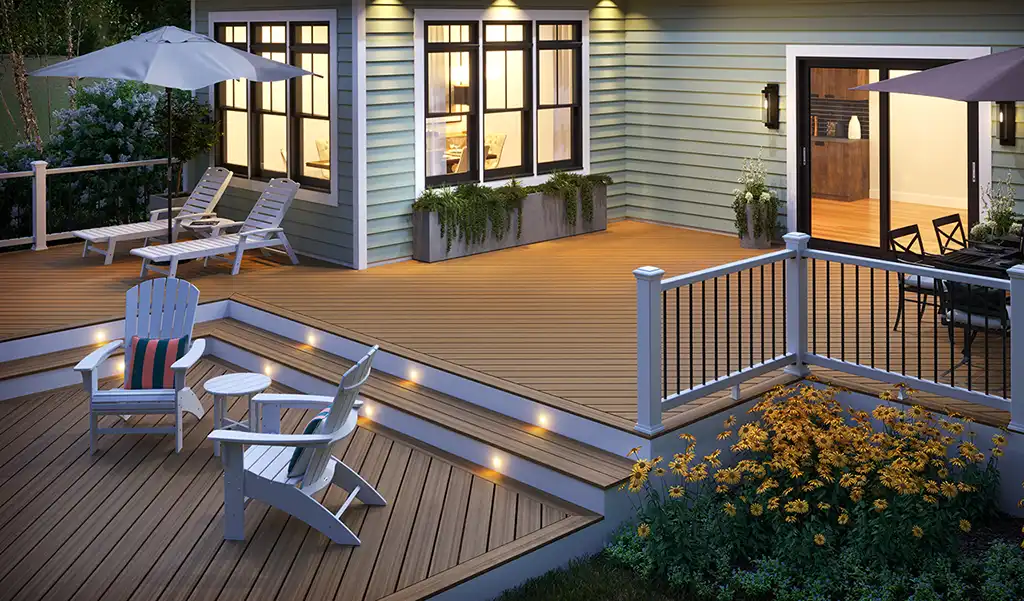 Photo of a multi-level deck attached to a home with an outdoor dining area and an area to relax.