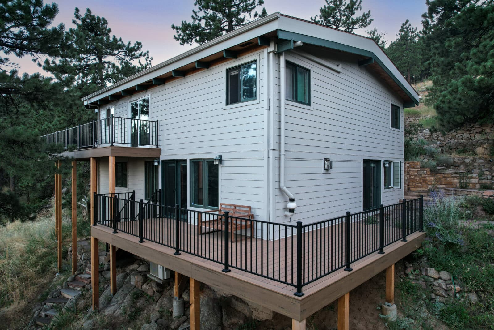 Photo of two new decks included a wrap-around decks on a home amid the mountains of Boulder, Colo.