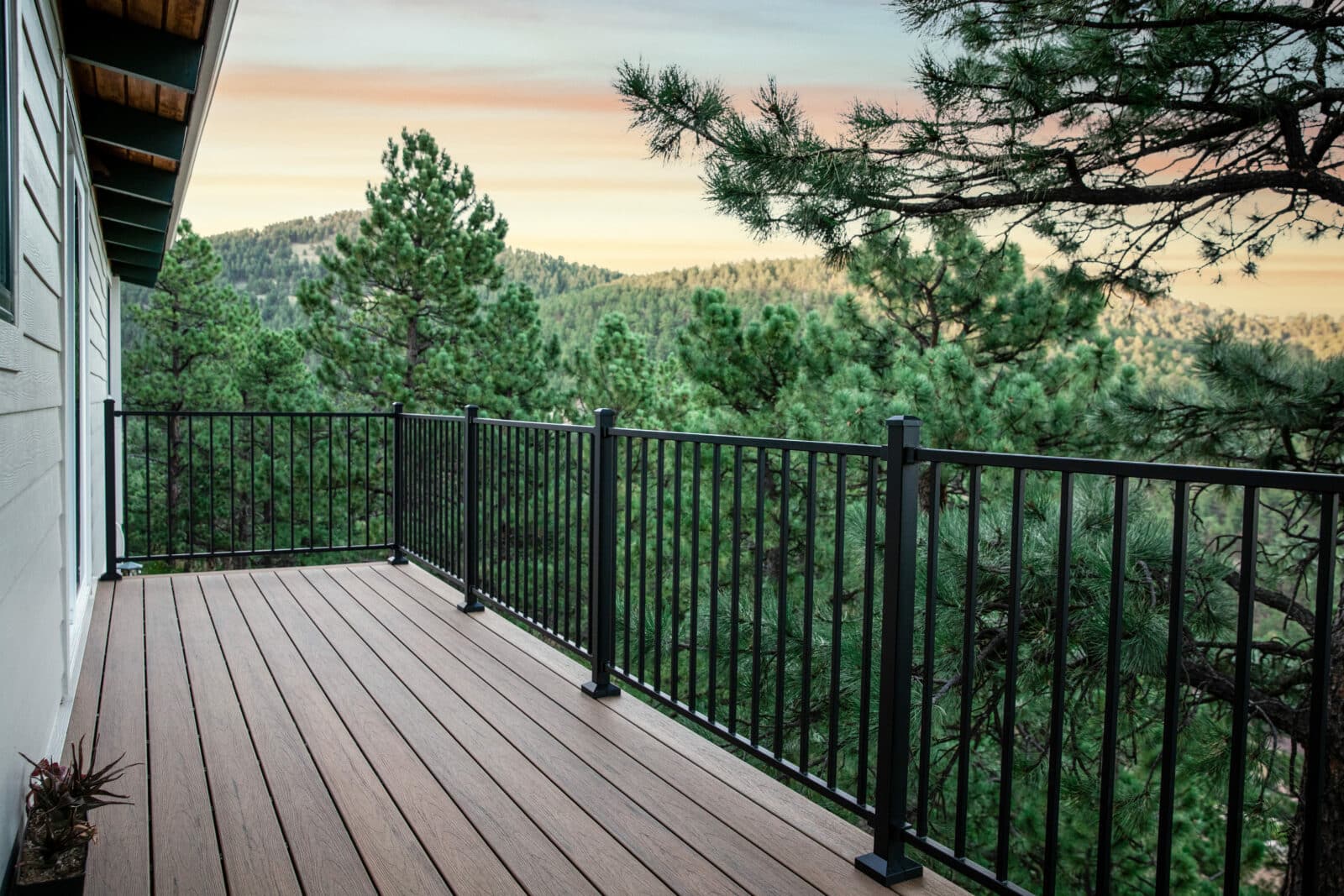 Photo of a scenic view of the Rocky Mountains from an elevated deck