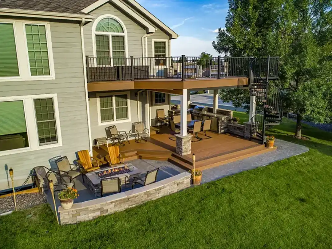 PHoto of an elevated deck with an underdecking area and a fire table