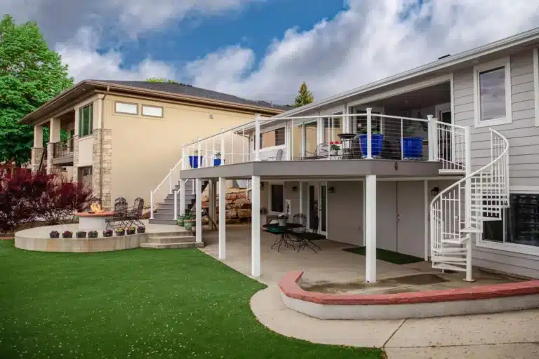 elevated deck with patio and fire pit